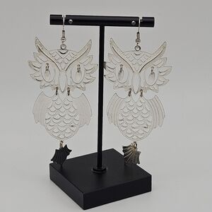 large silver tone articulated owl dangle earrings